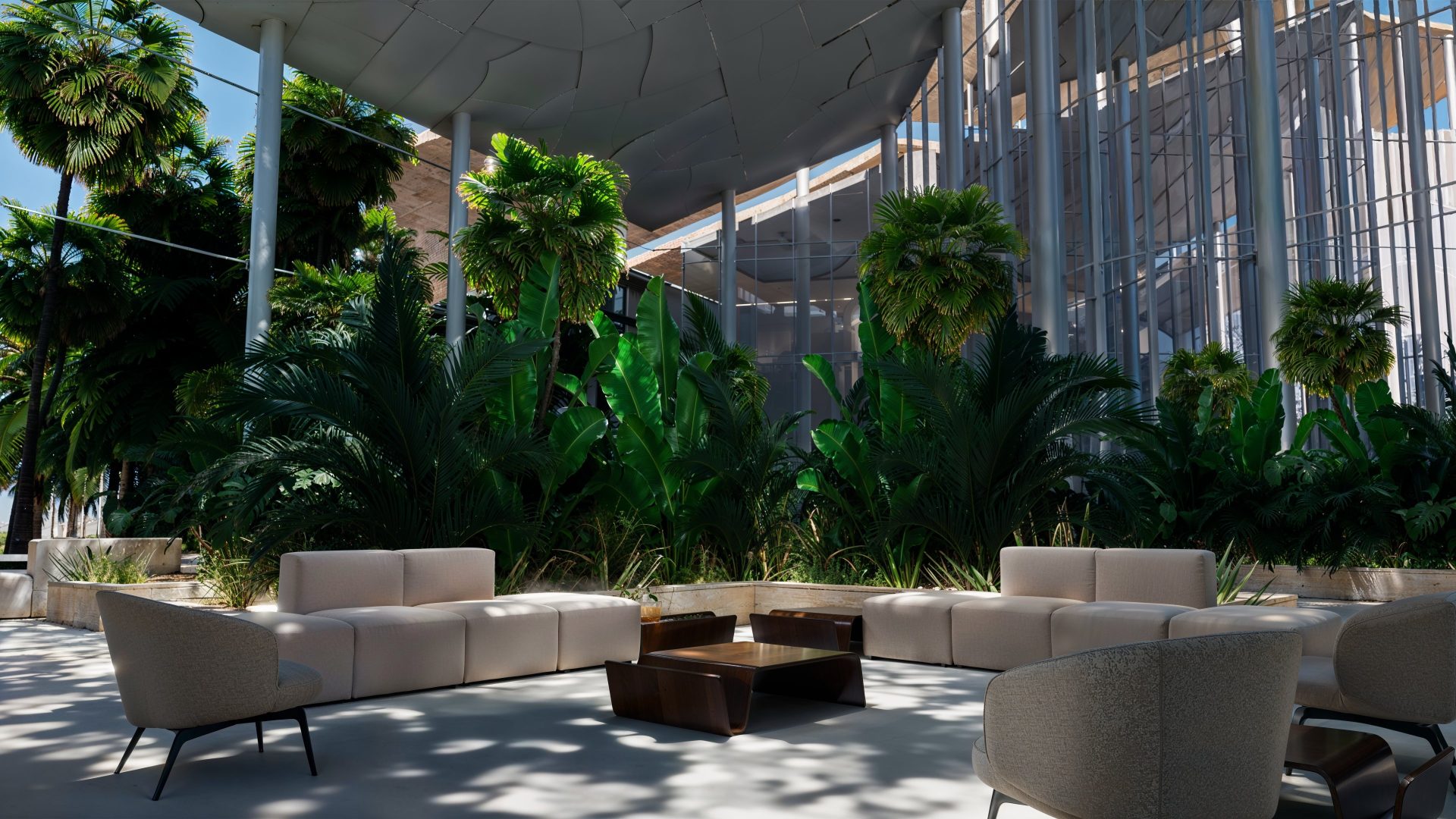 Coin détente moderne et ombragé dans un jardin d’intérieur végétalisé du centre COP16, avec fauteuils design et ambiance naturelle